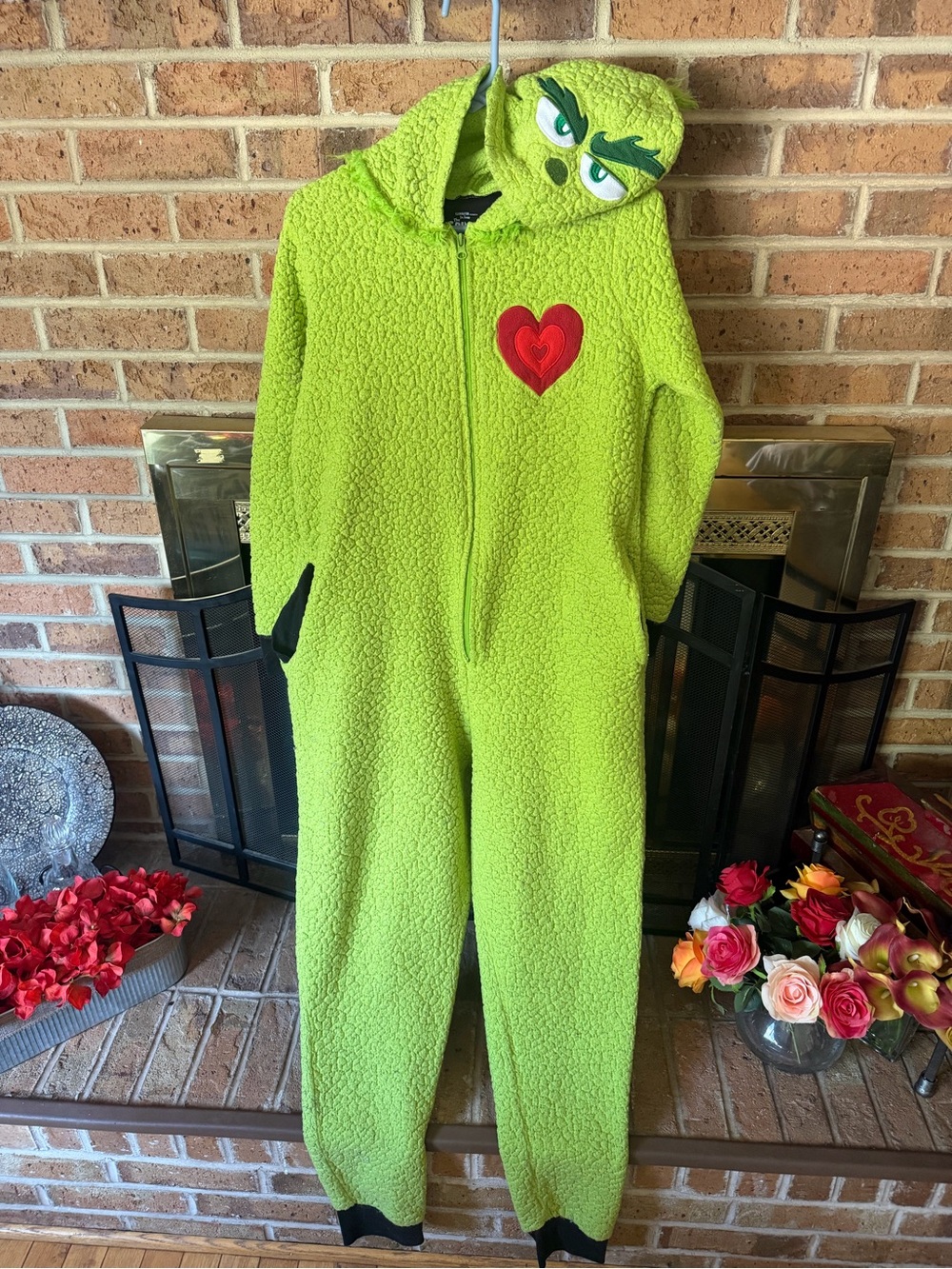 Green Grinch-Inspired Sherpa Footie with Heart Patch